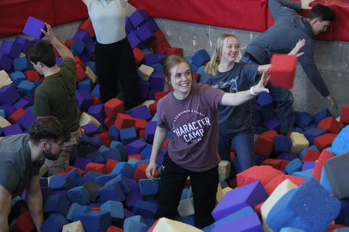 Students participating in a service project during Character Camp